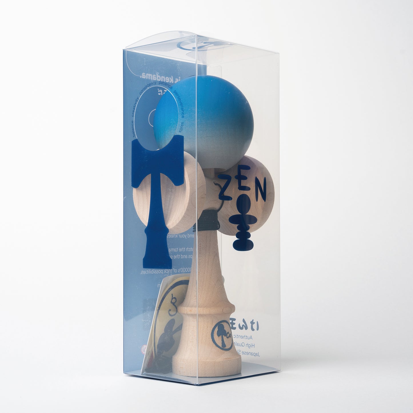 Kendama toy with blue to silver fade matte paint in box. Maple ken, beech tama, Kendama Co Zen Shape.