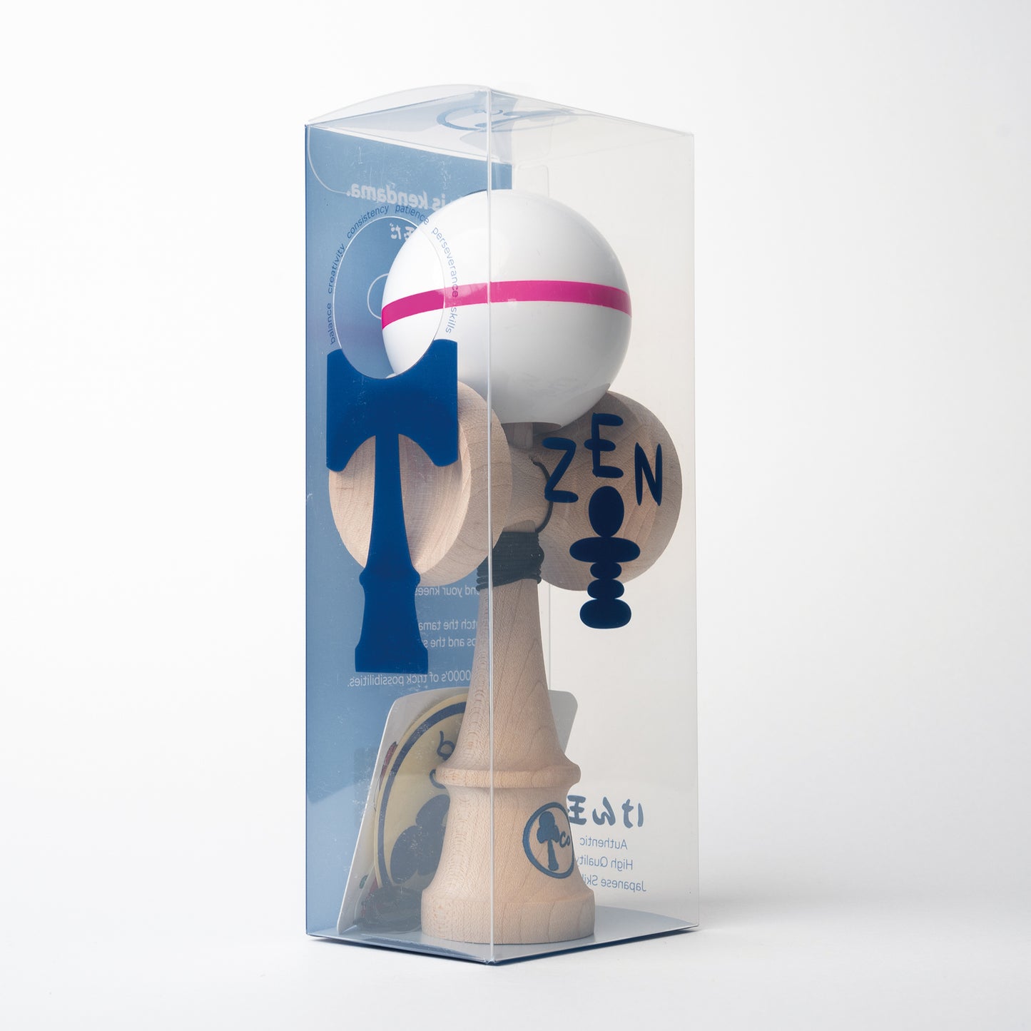 Solid white kendama toy with a pink stripe in box. Sticky paint, maple ken, beech tama, Kendama Co Zen Shape.