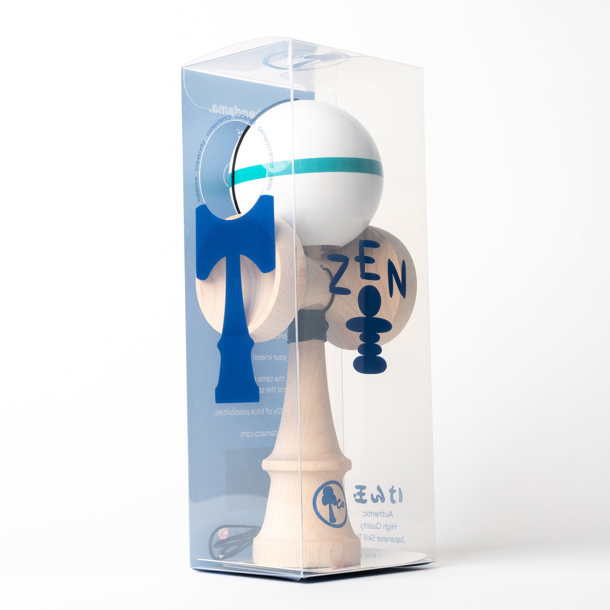 Solid white kendama toy with a aqua stripe in box. Sticky paint, maple ken, beech tama, Kendama Co Zen Shape.